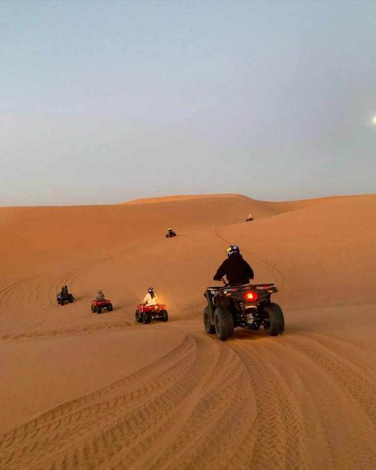 Sweeping golden sand dunes of Erg Chebbi at sunrise in the Moroccan Sahara Desert near Merzouga